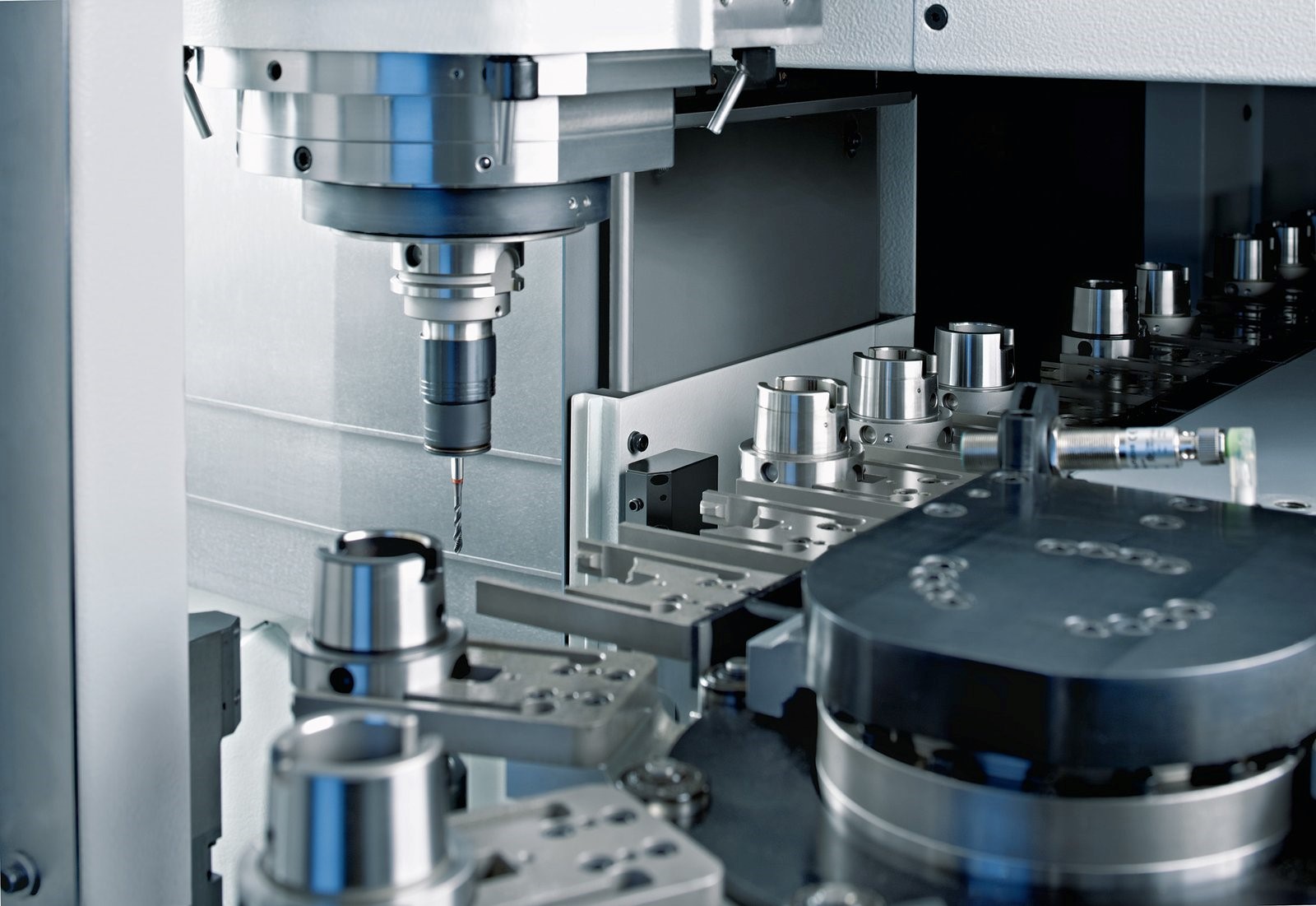 Smart CNC production line with robotics and IoT sensors
