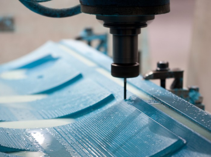 Engineers reviewing prototype parts in a China manufacturing lab